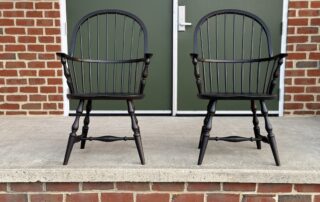 New Pair of Jefferson Windsor Armchairs in antique black over red finish with classic sack back design.