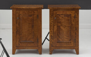 Pair of American Made Cabinets with raised panel fronts in tiger maple wood.