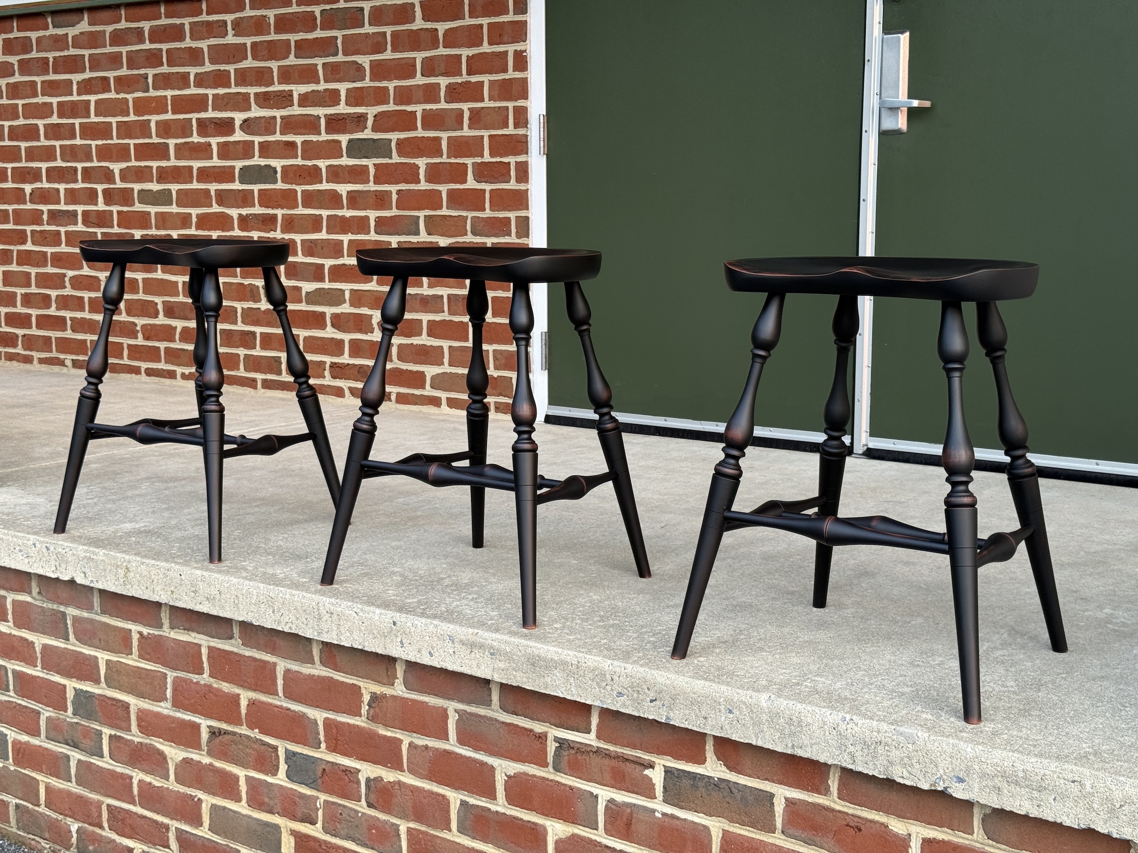 Three Saddle Seat Counter Stools-image