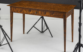 Tiger Maple Wood Desk with dovetailed drawer and tapered legs, shown with beautiful wood grain.