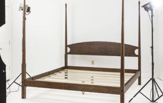 Cherry king size pencil post bed with tall posts and simple country design.
