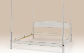 Historical Tokeneke Pencil Post Bed shown in linen finish with pencil posts and classic finials.